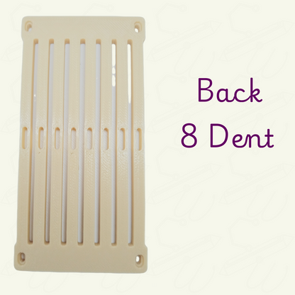 Beige rigid heddle 2 inch section at 8dent on a light beige background. Back image showing the smooth side with 8 holes and 7 slots.